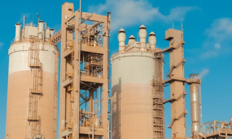 A view of urea towers at an industrial plant in Libya, captured on a clear day.